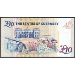 Guernesey - Pick 57c - 10 pounds - Série E - 2004 - Petit numéro - Etat : NEUF